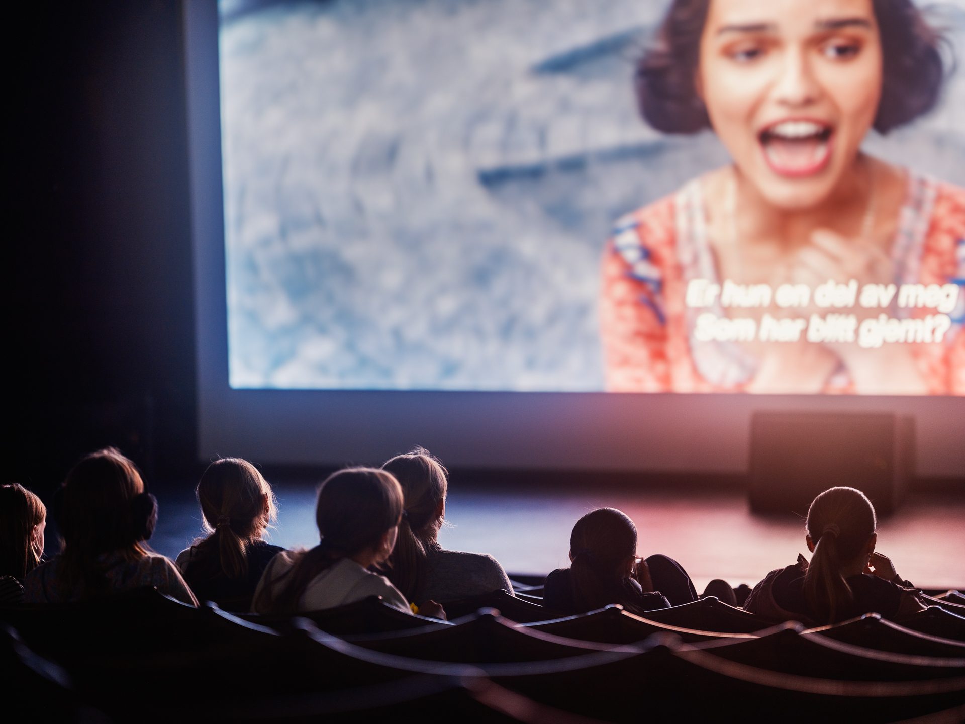 Movie goers watching the new sleeping beauty at the cinema