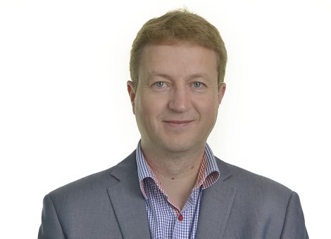Portrettbilde av Arne Erik Bertnzen, IT-sjef i Posten Norge.